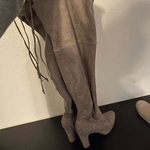 Thigh high heeled boots